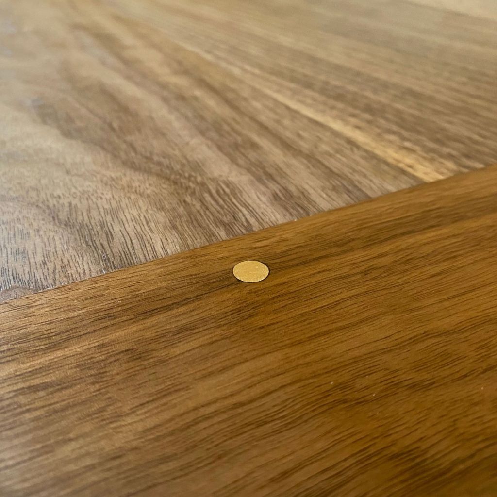 Walnut Hairpin Leg Dining Table Brass Pin Close Up Sam Alton Woodwork Peak District 
